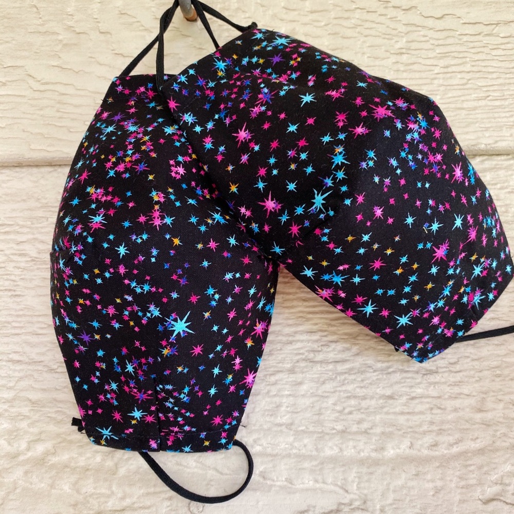 Black mask with blue pink stars with filter